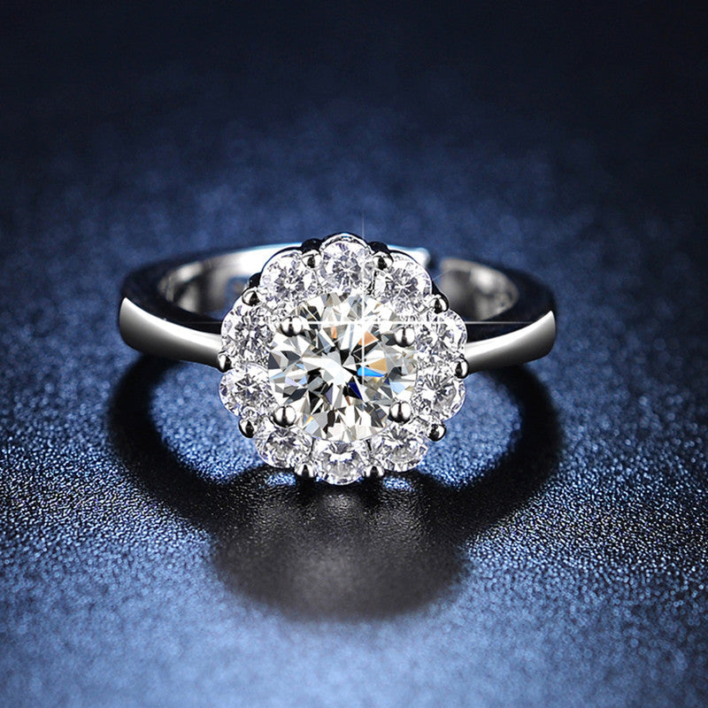 The "Eternal Bloom" Halo Moissanite-Style Ring | Premium Anti-Tarnish Silver | Adjustable Luxury Engagement RingRadiance that lasts a lifetime. 💎✨ Step into the spotlight with our Eternal Bloom Halo Ring.